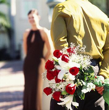 giving flowers to a woman